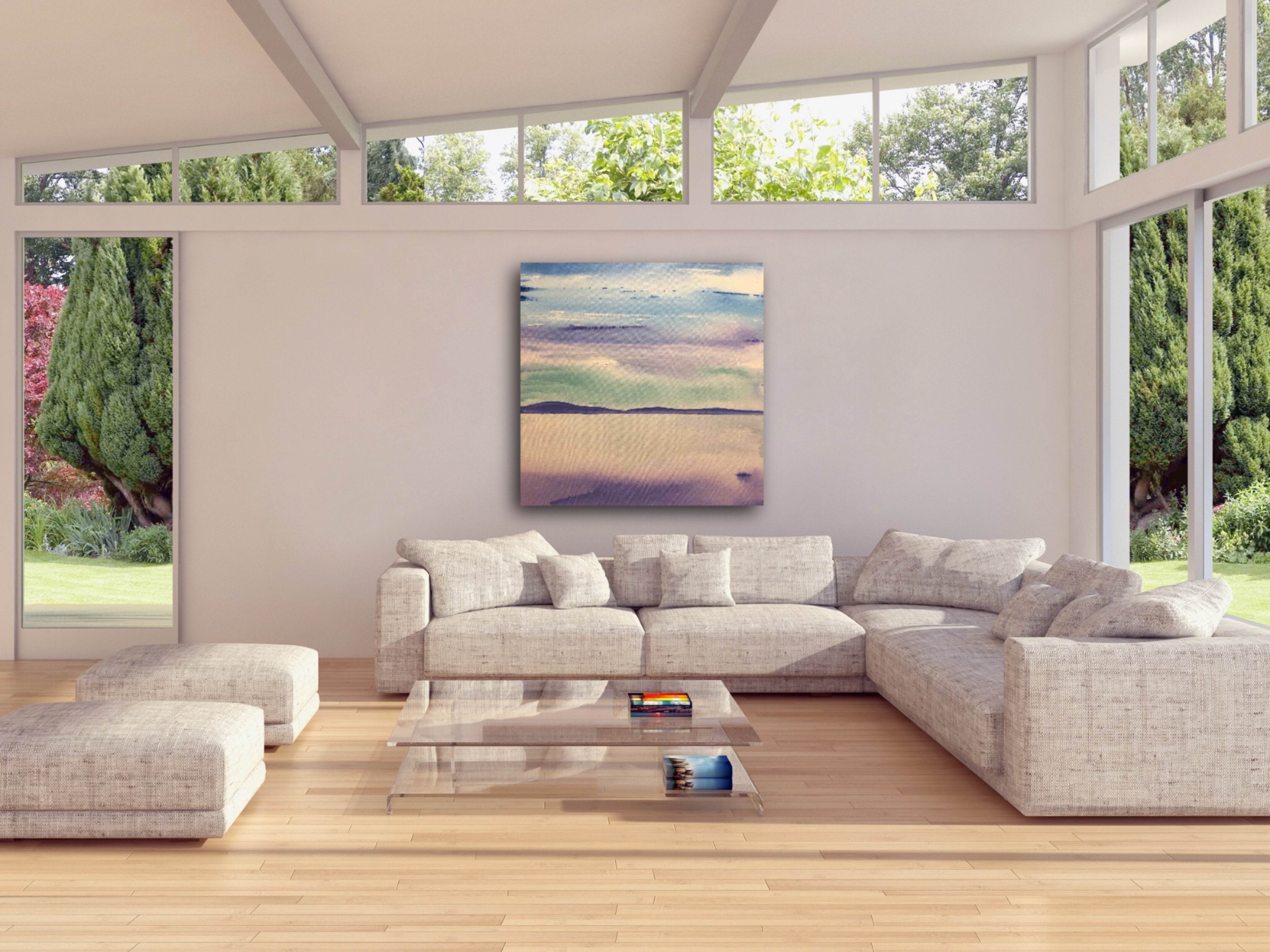 ocean and mountain painting in living room