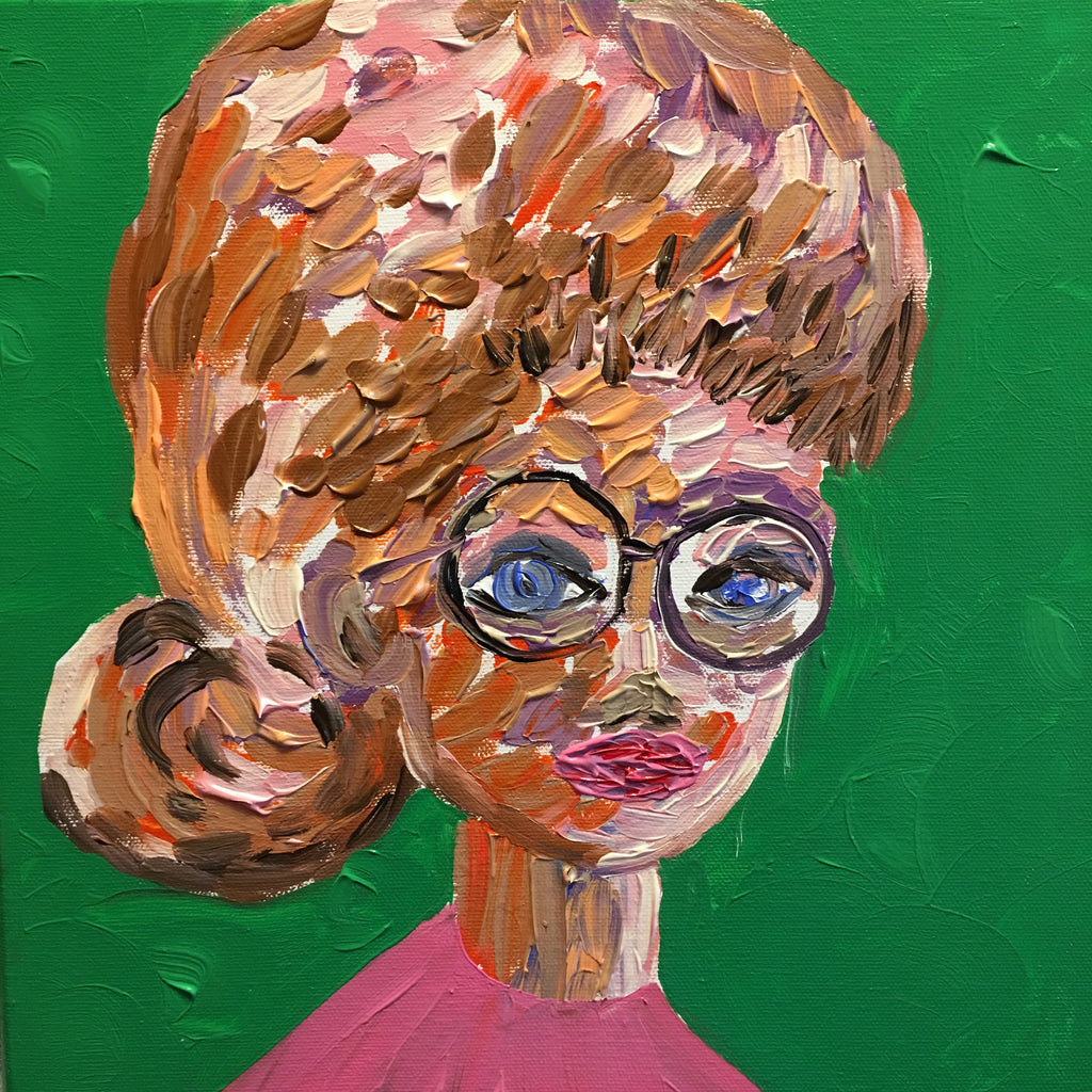 woman on eyeglass and low bun hair
